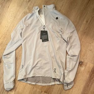 Women clima shirt size L brand new tag still on… super lightweight ON RUNNING